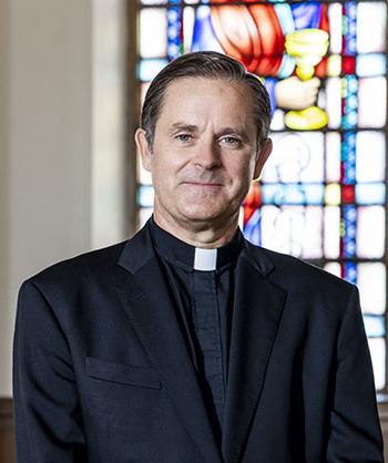 July 20, 2022 -- 电子游戏软件's Dean of the School of Theology and Ministry, Fr. Michael "Mick" 麦卡锡年代J. Photographed in Simboli大厅.