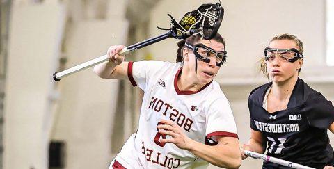 Charlotte North in lacrosse gear