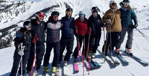 students skiing on a mountain